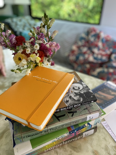 A photo of a stack of books.